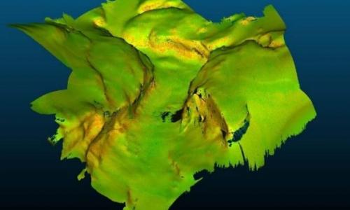 3D representation of the engorgement of the canyon walls at the upper canyon head area. The reddish colors indicate regions with high backscatter values, which reflect hard substratum susceptible of hosting CWCs. 